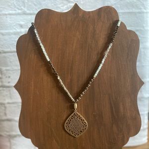 Long beaded pendant necklace